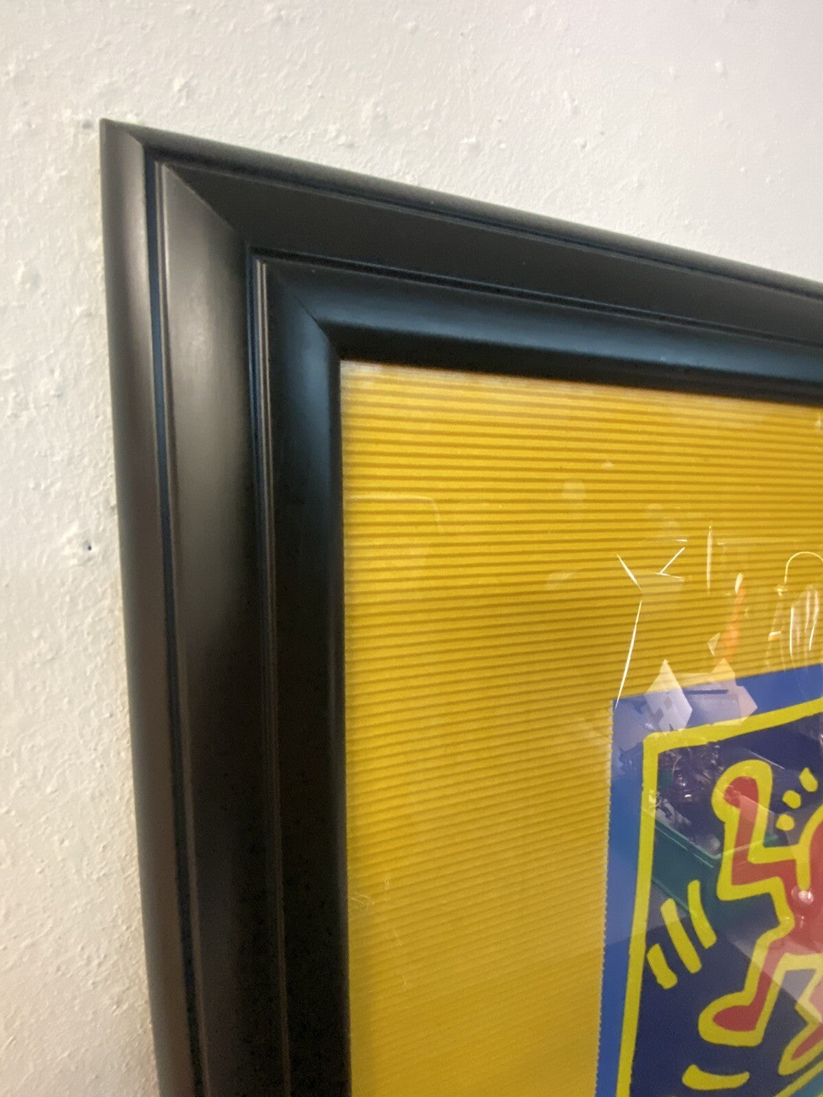 Bild Keith Haring Dancers Yellow 70x90 cm im schwarzen Rahmen/ Glas